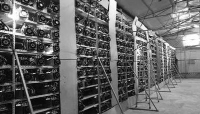 Vast rows of mining rigs in a high-tech cryptocurrency mining farm